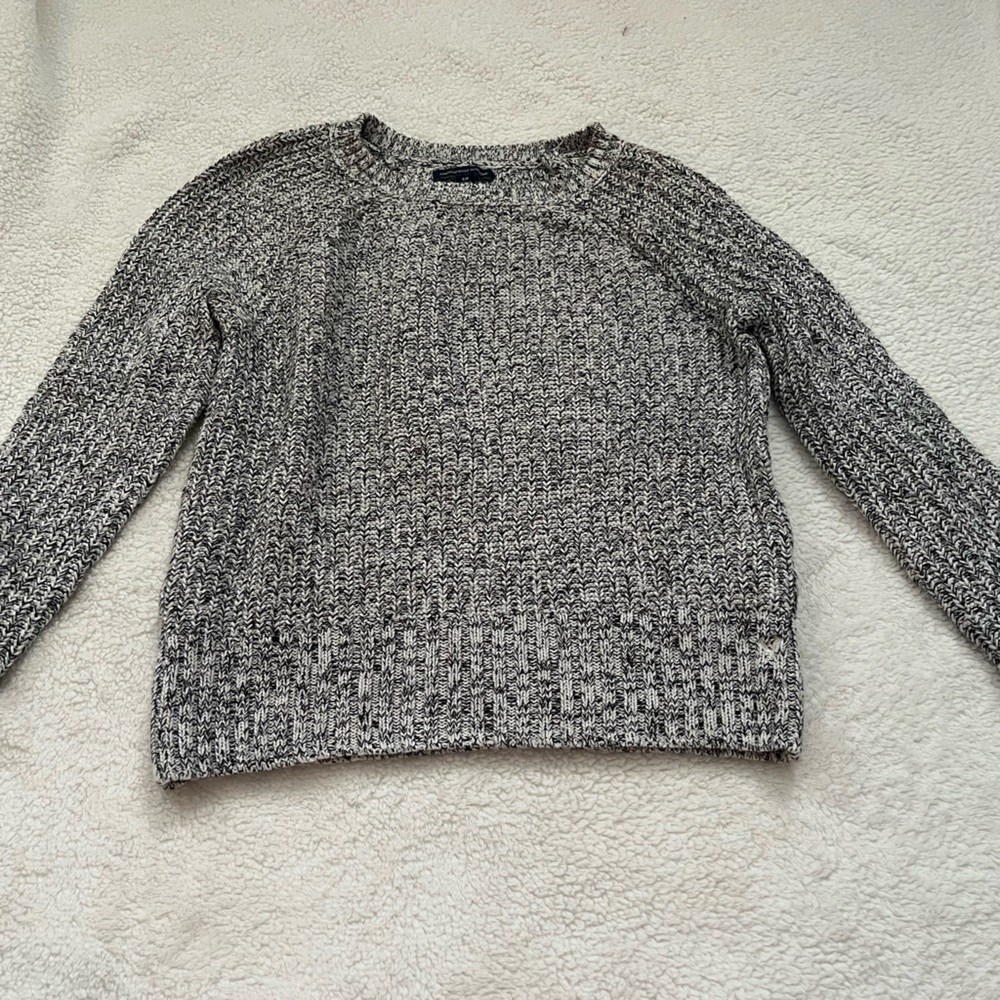 A gray sweater! Very cute! And a size small!